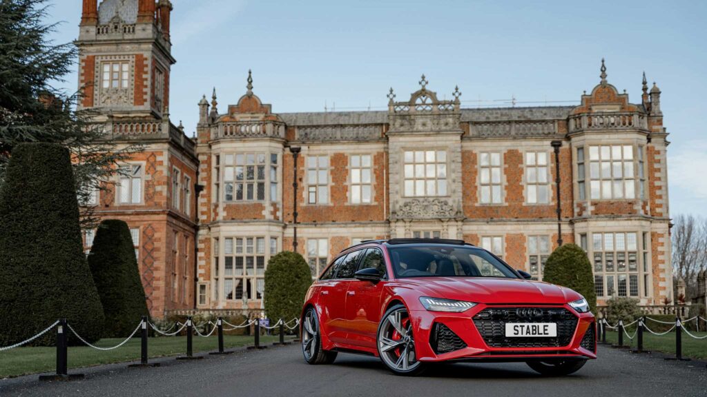 Car in front of mansion